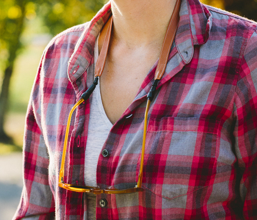 Women wearing Croakies Saddleback Leather Sunglass Strap wide oakbark
