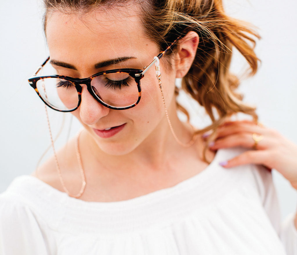 Women wearing Croakies Sienna Sunglass Strap Rose Gold